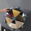 Boîte tournante de rangement des grains